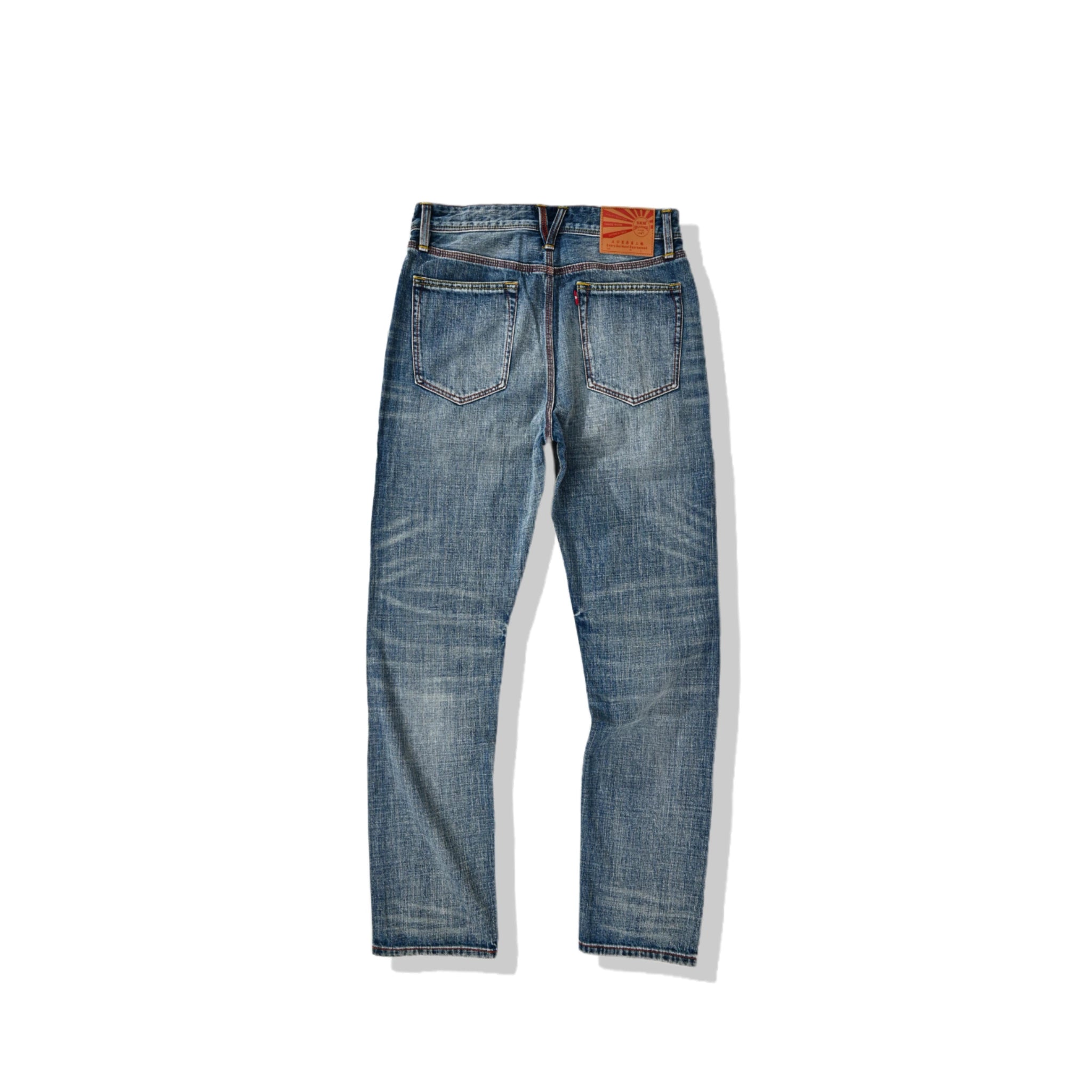 Jean selvedge bleu moyen coupe slim 12 oz avec un léger effet flammé