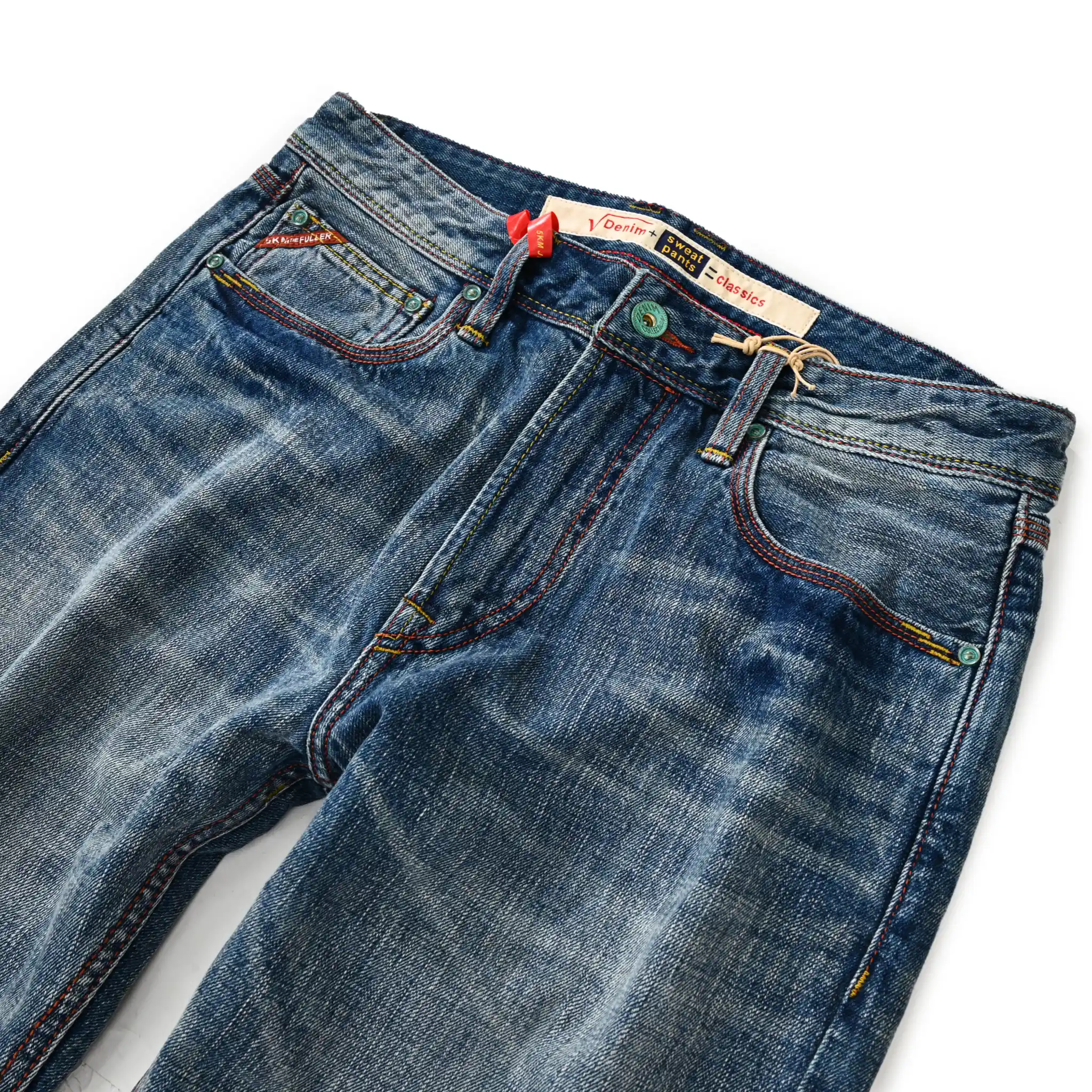 Jean selvedge bleu moyen coupe slim 12 oz avec un léger effet flammé