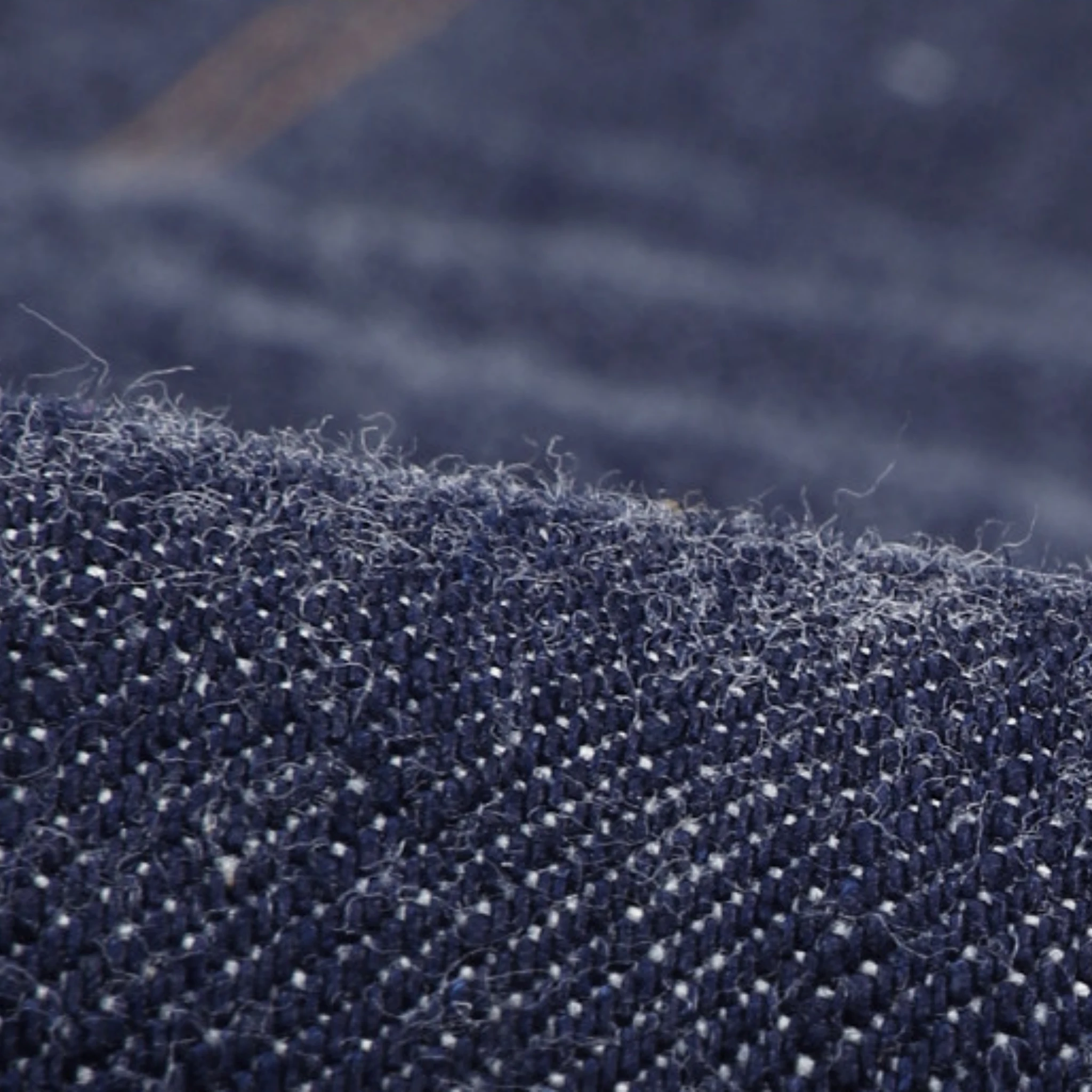 Close-up of the material texture on 17oz Raw Selvedge Denim Jeans – Unsanforized Slim Tapered Fit