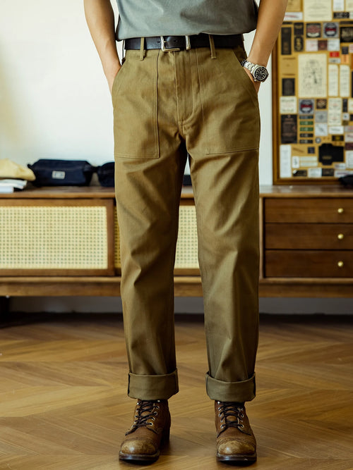 Front view of model wearing sage green 12oz Olive P41 Straight Fit Utility Pants